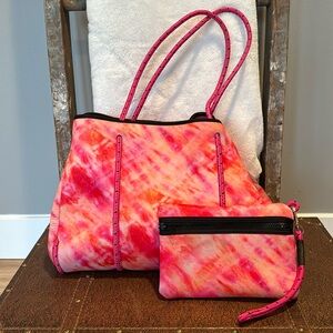 Haute Shore tote bag with matching makeup pouch. Pink and orange tie dye print